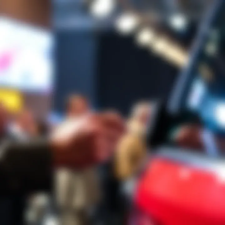 A close-up of hands bidding at an auction for a car, focused on a bidding paddle with a bright background