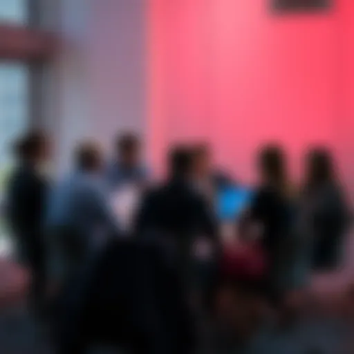 A group of people seated around a table discussing cheating allegations with documents and laptops open, looking engaged in conversation.