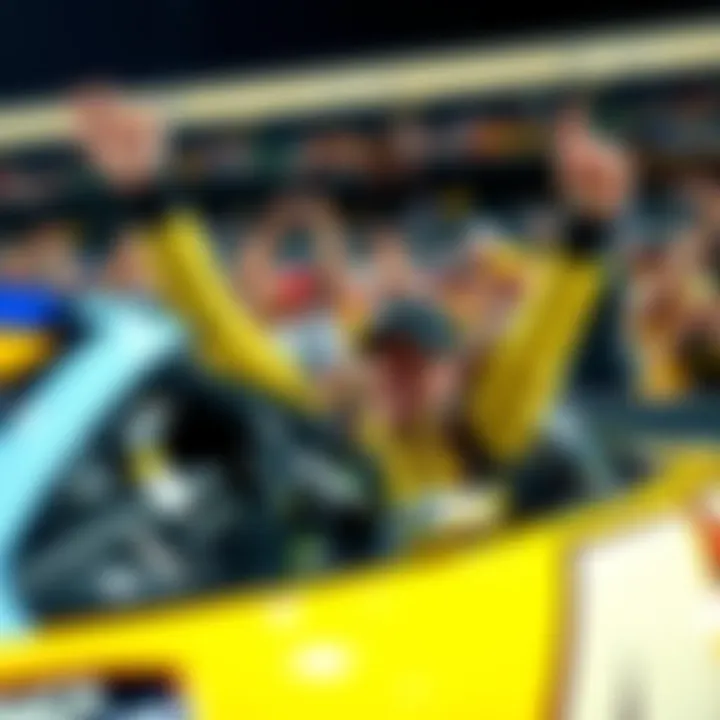 Josh Wise Racing with Fans Josh Wise in his race car celebrating with enthusiastic fans at a motorsport event