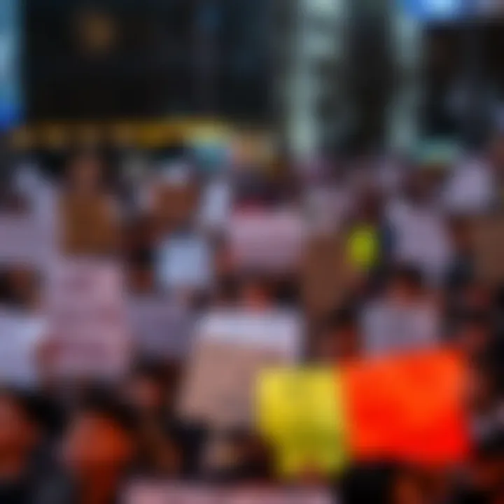 A crowd of people holding signs with messages of concern and unity, symbolizing collective voices at a rally or protest.