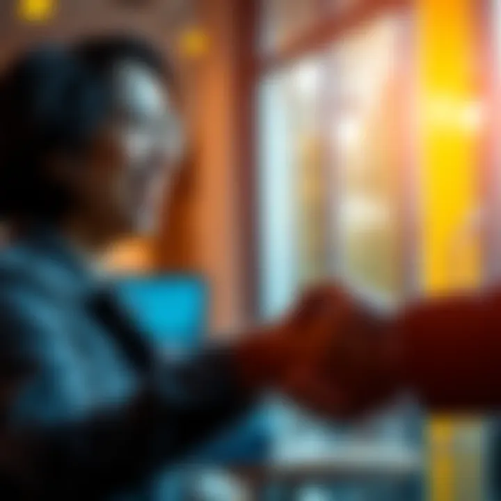 A person smiling and expressing gratitude to another person with a handshake