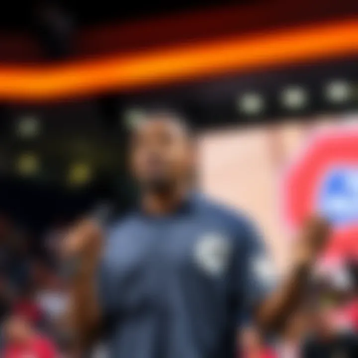 Russel Okung passionately advocating for athlete rights on stage at a sports event.