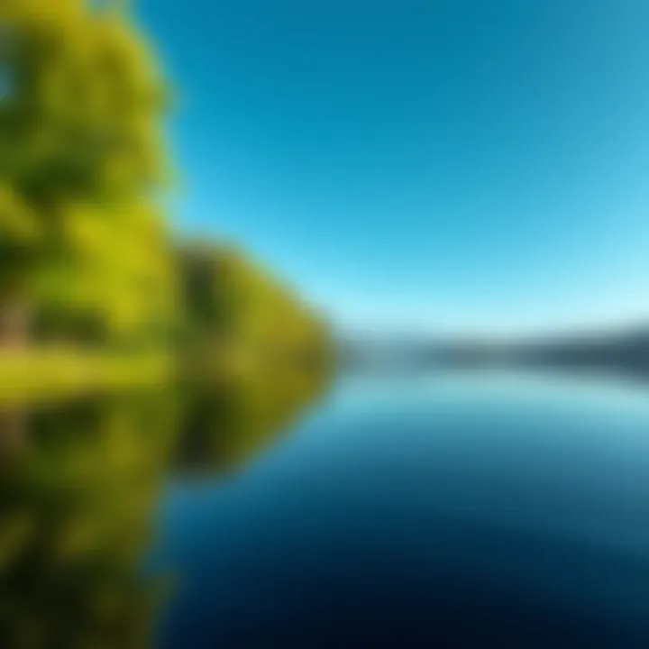 Serene Nature Landscape A calm nature scene with green trees and a tranquil lake reflecting the blue sky.