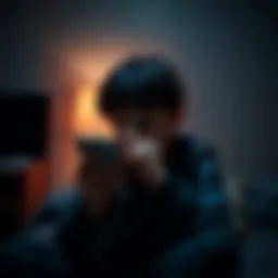 A frightened teenager holding a phone, looking worried while sitting alone in a dimly lit room, symbolizing vulnerability and a call for support.